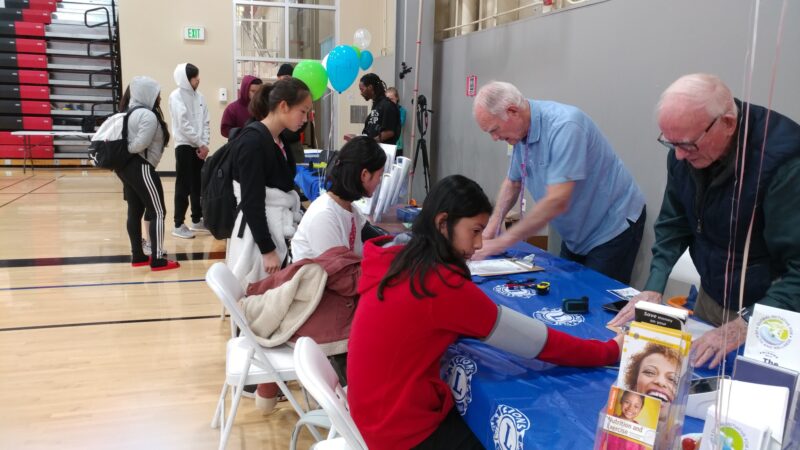 staff at clinic table