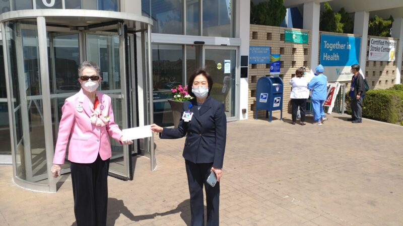 Eleanor receiving donation